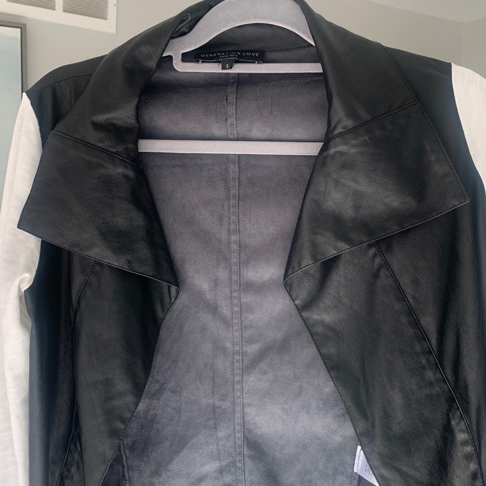 Generation Love Black faux leather body with off white cotton sleeve
